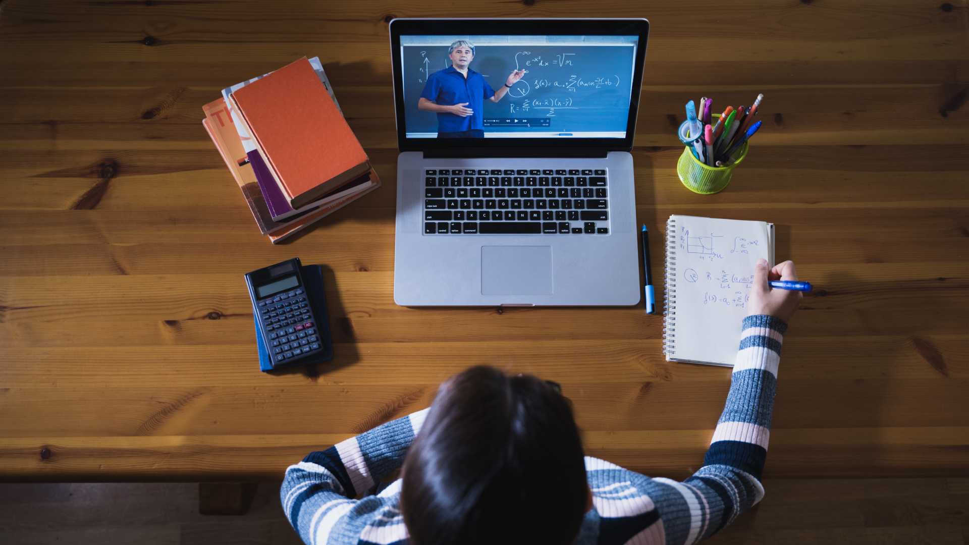 Student by laptop with eLearning course