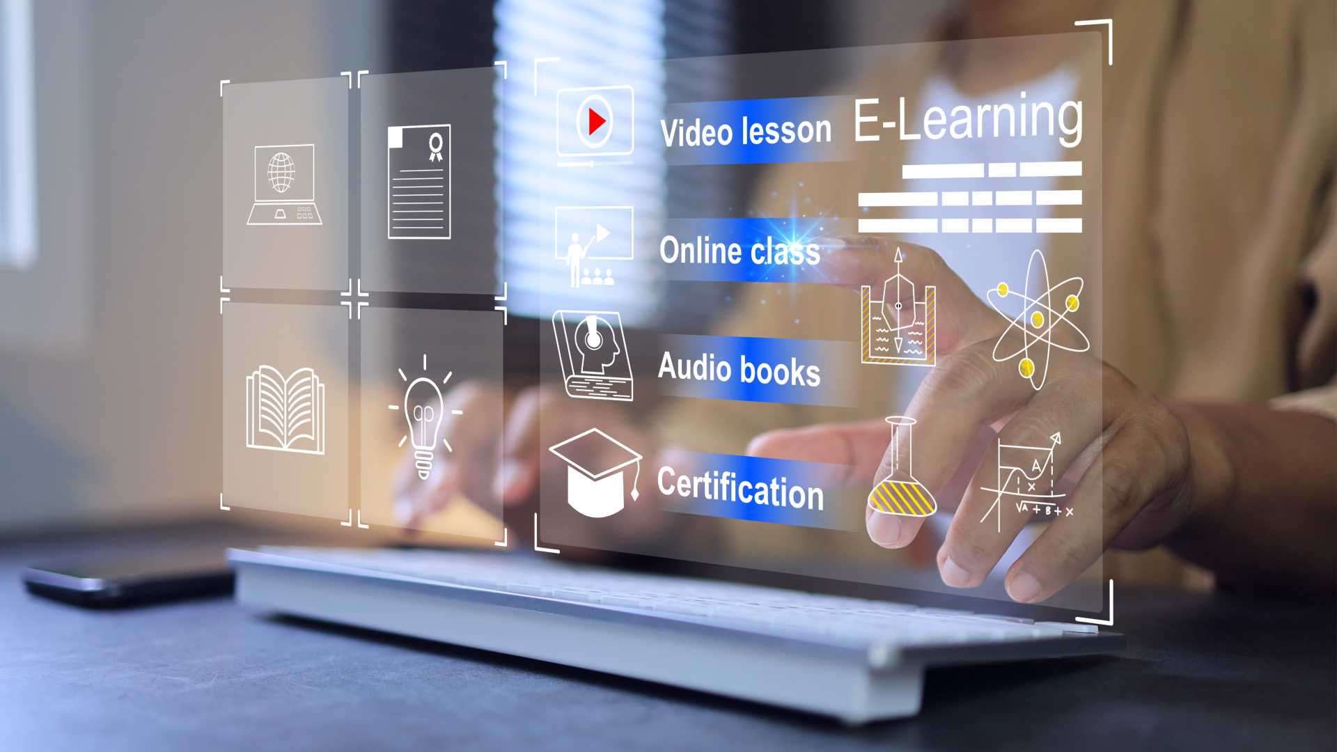 Digitized holographic screen casting learning and development tech and eLearning above a keyboard person learner typing on keyboard