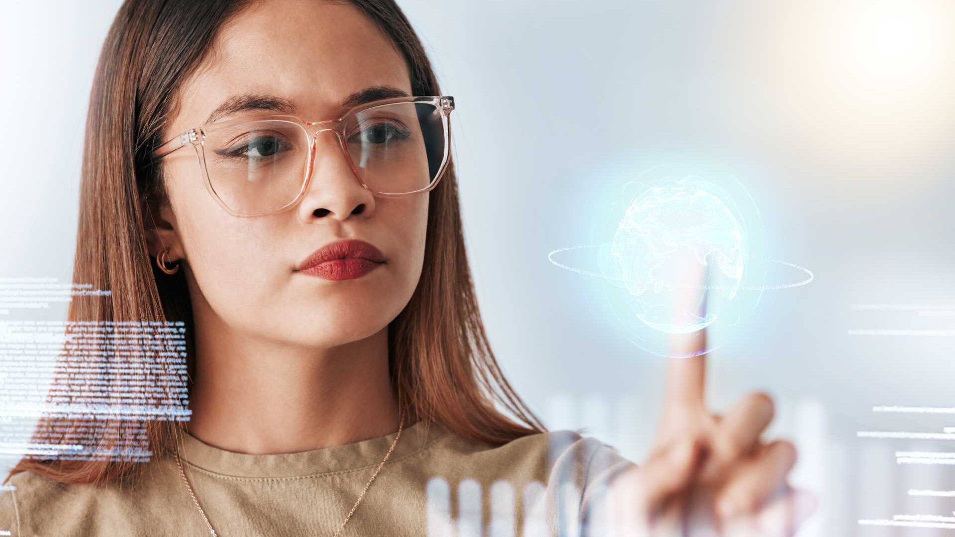 A woman pointing at a technological visual graphic representing artificial intelligence
