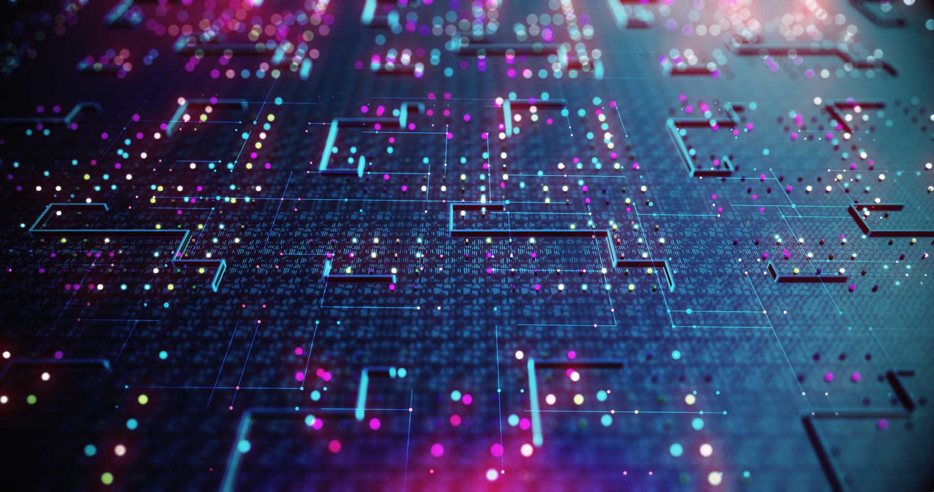 A machine board with pink, blue, and purple lights