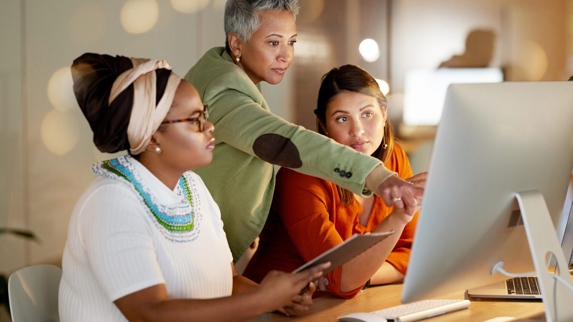 Teamwork businesswomen on computer for research, communication or creative strategy.