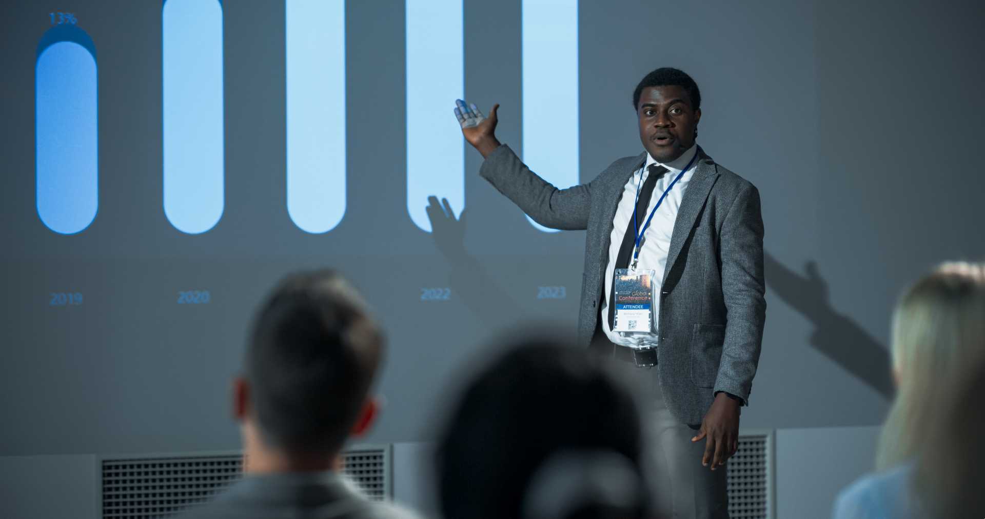 Man giving PowerPoint presentations.