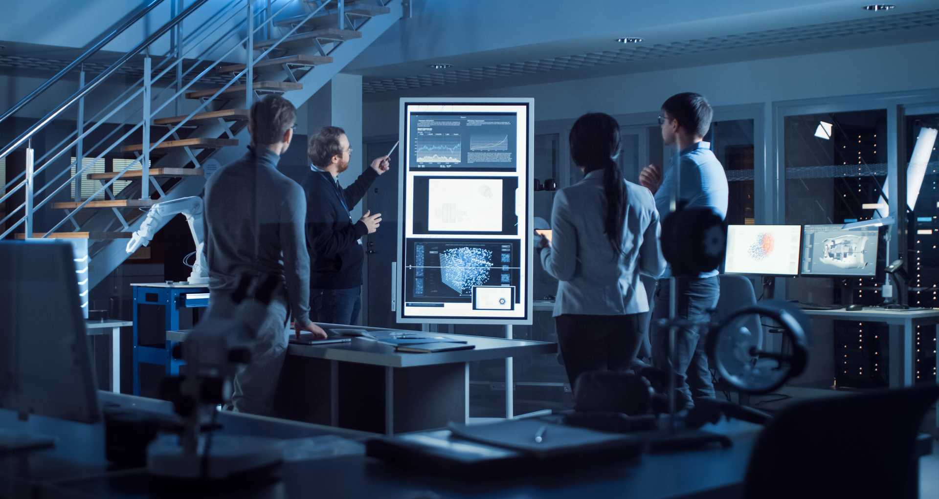 A group of people looking at data