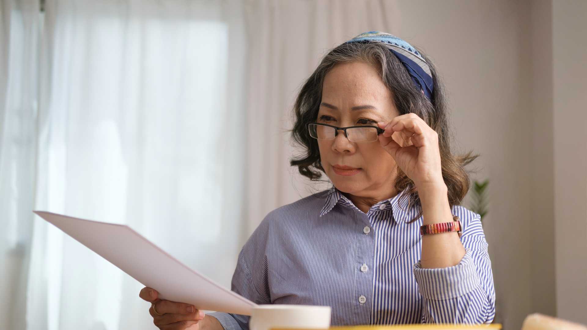 Woman looking at documents.