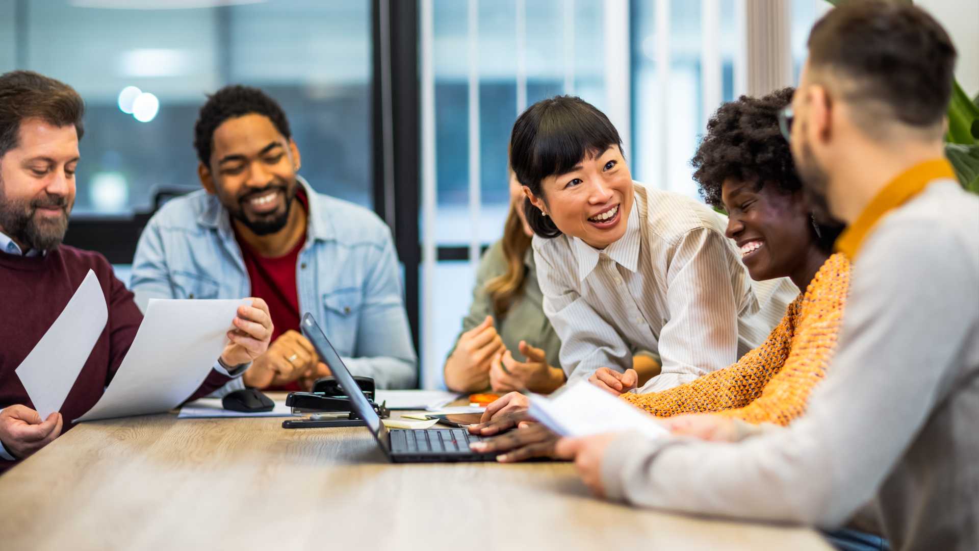 Group of coworkers together in a meeting.