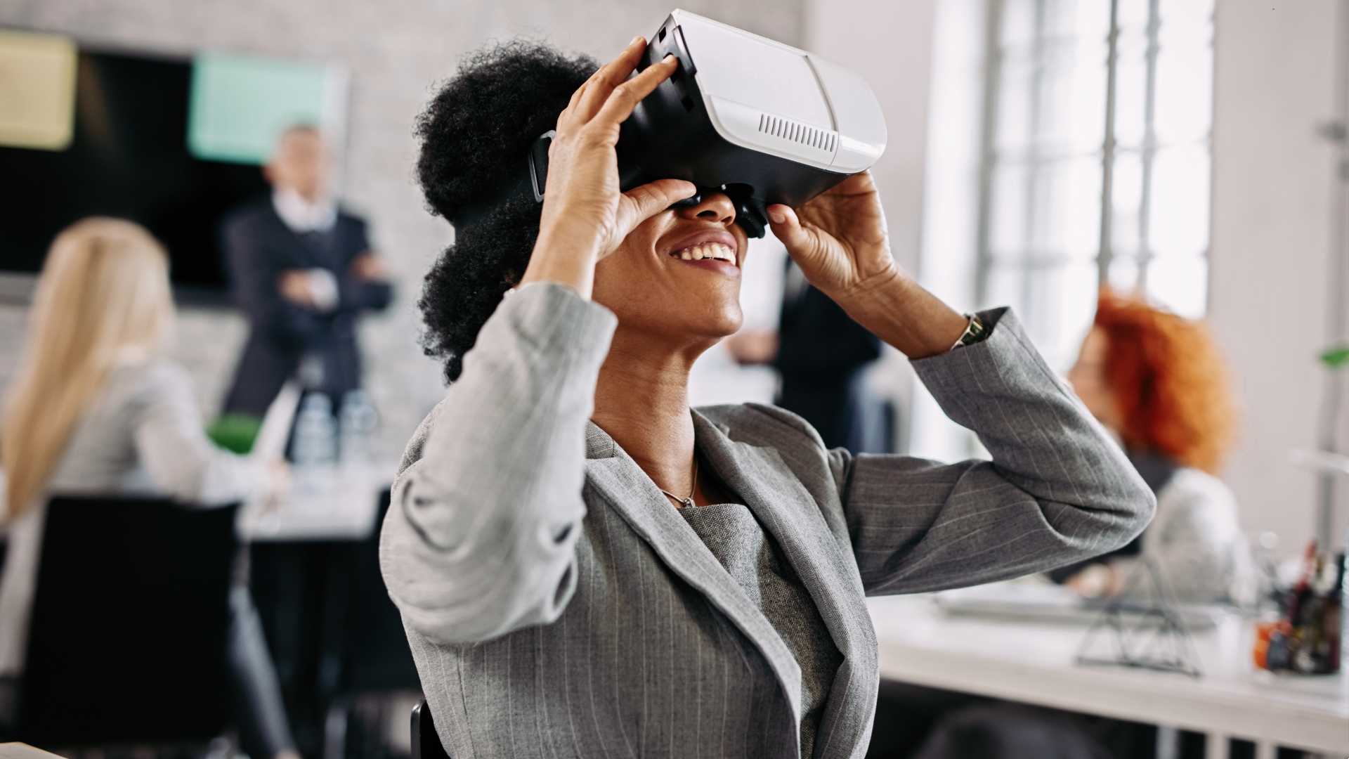Woman worker using VR headset for training.