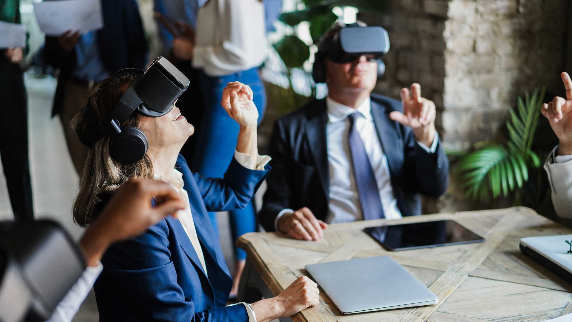 People in the office wearing VR goggles for work.