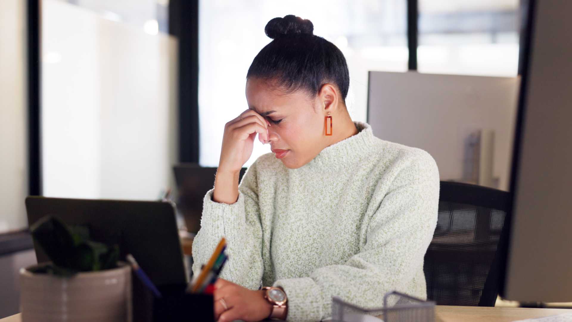 Woman getting frustrated with work.