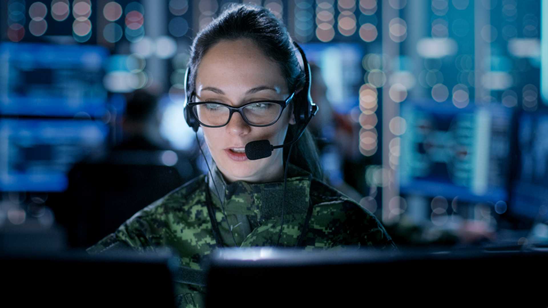 Woman helping with a call line about something.