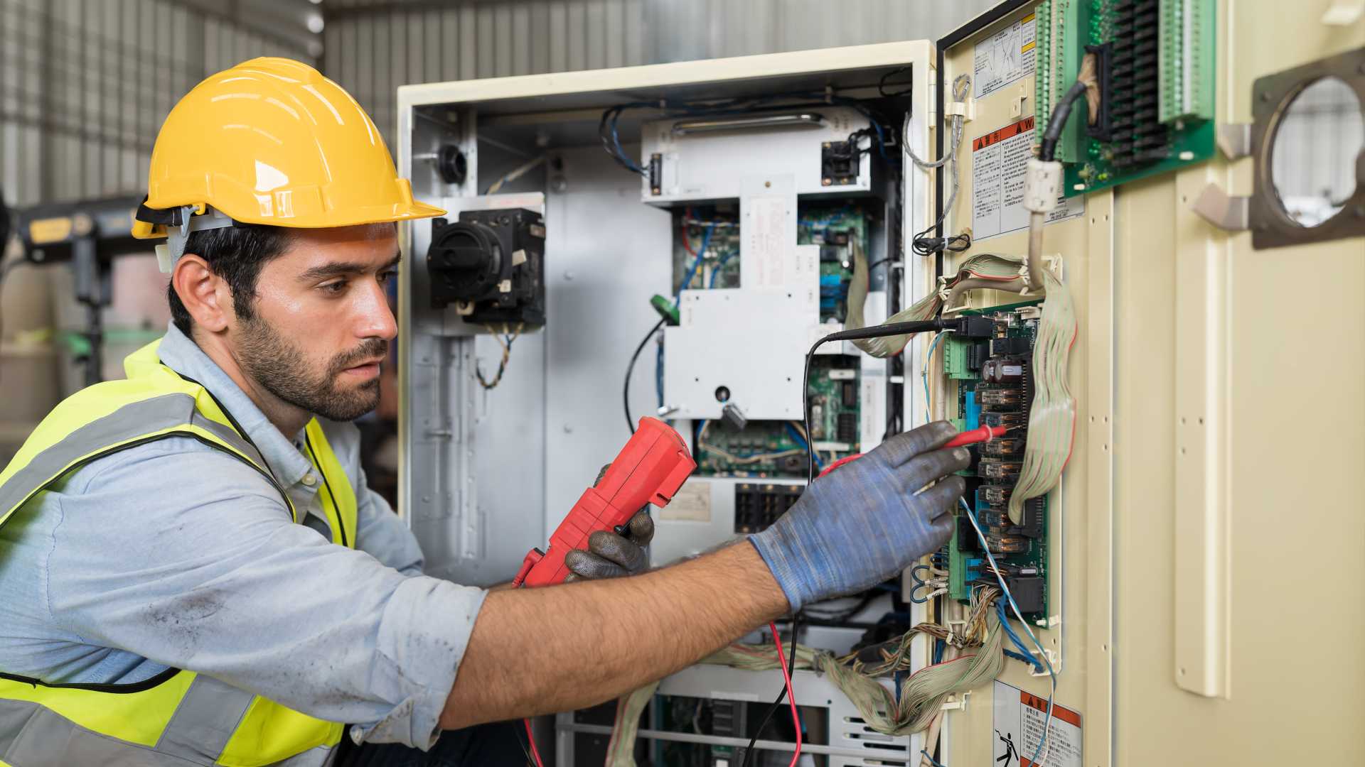 Frontline worker looking at a Fusebox.