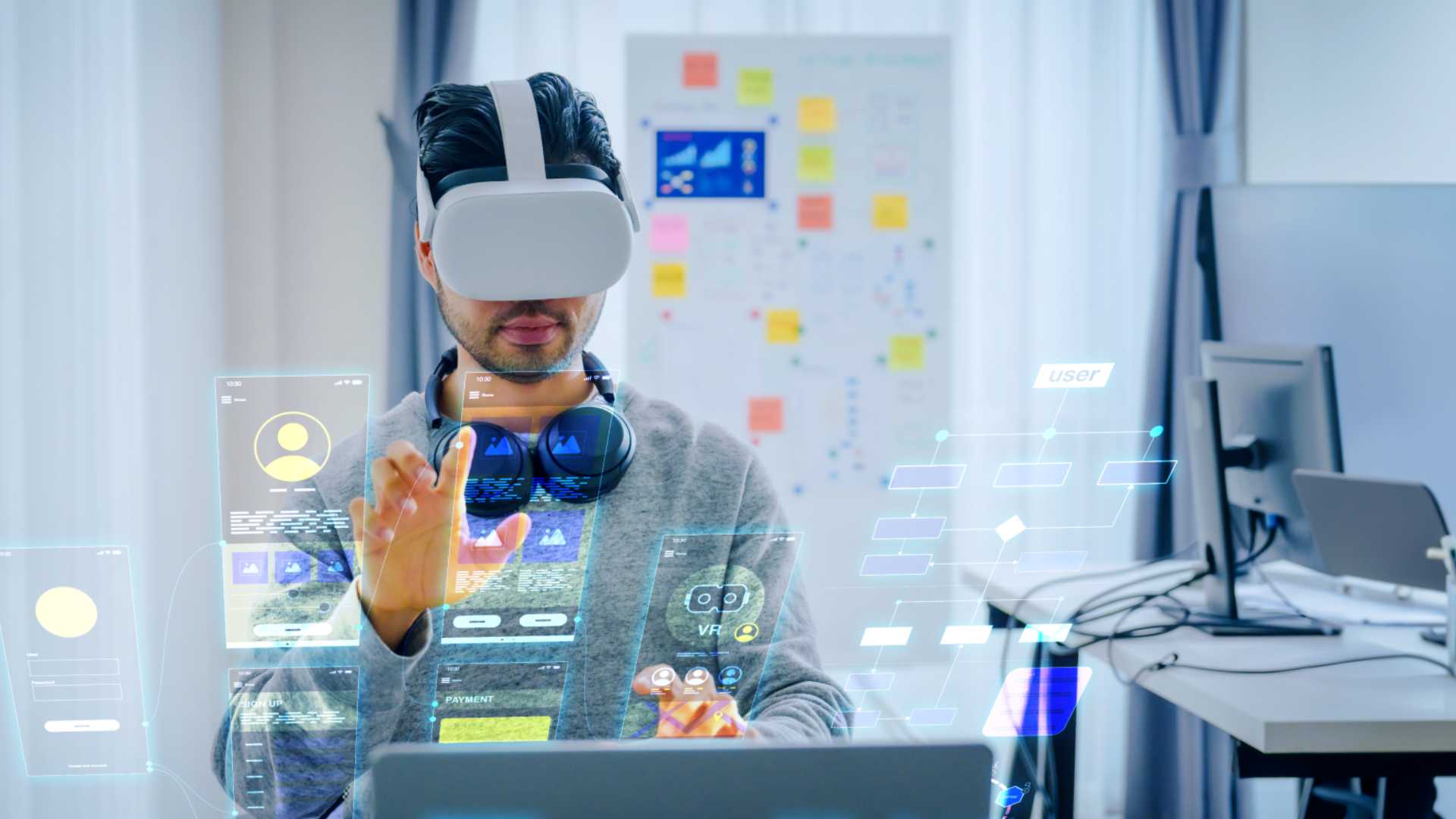Man using VR headset for work.
