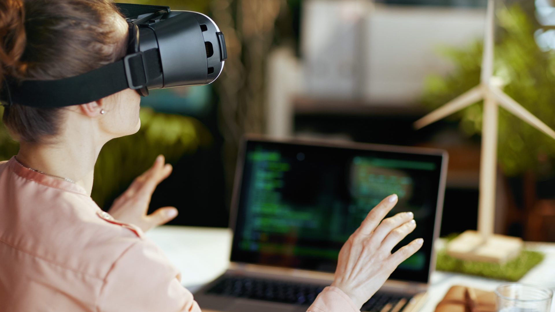 Woman using VR googles for work.