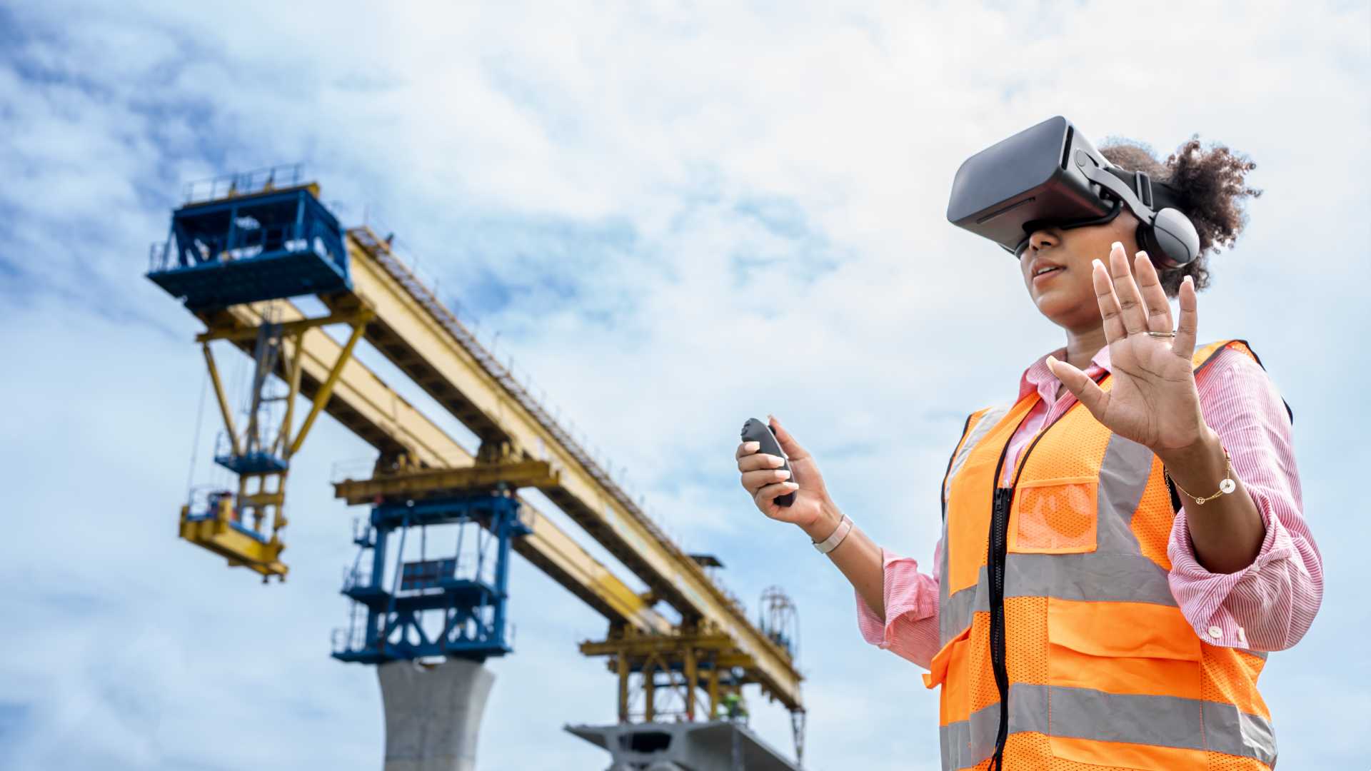 Woman using VR headset for work.