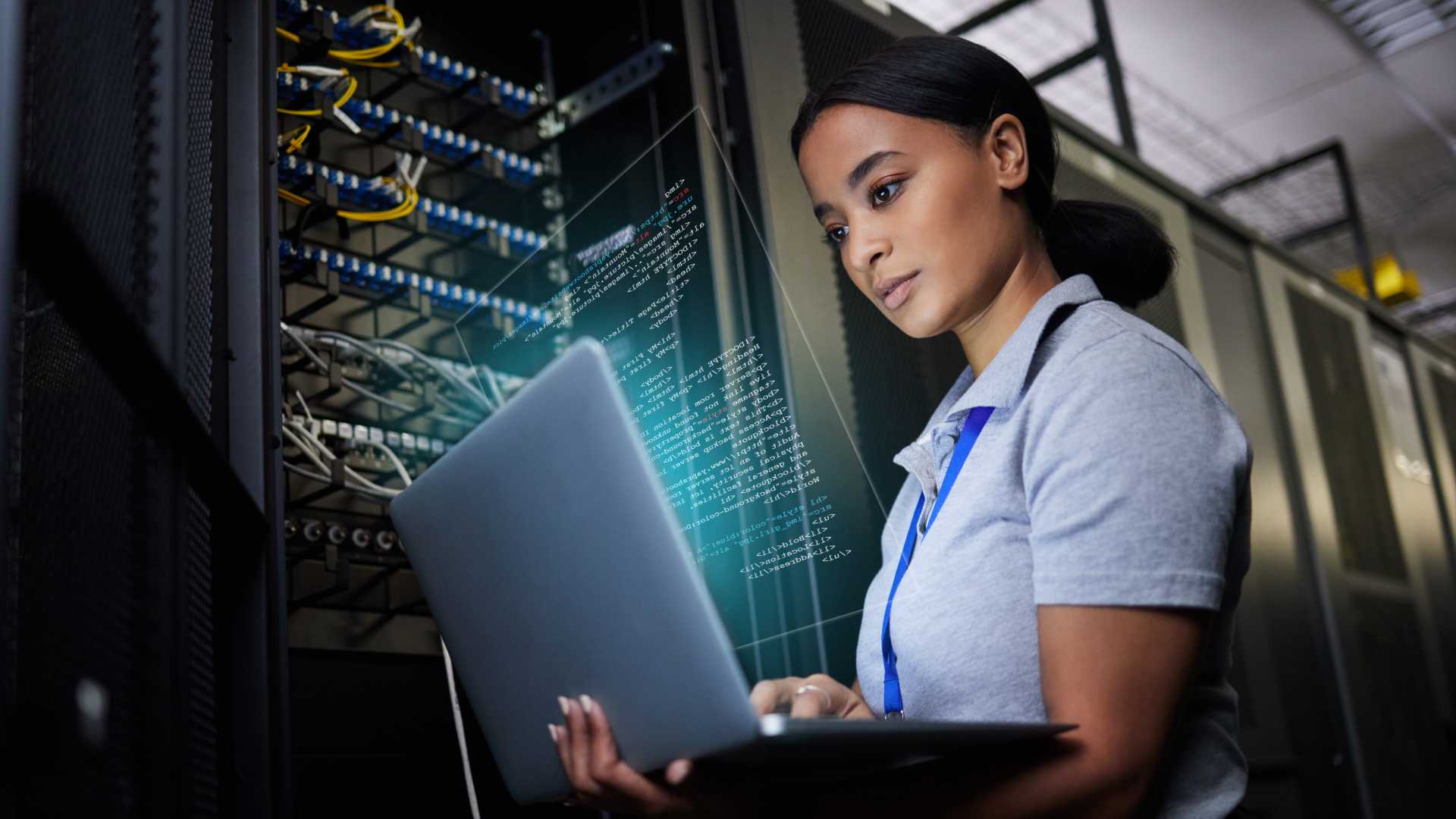 Woman looking at her computer for cybersecurity.