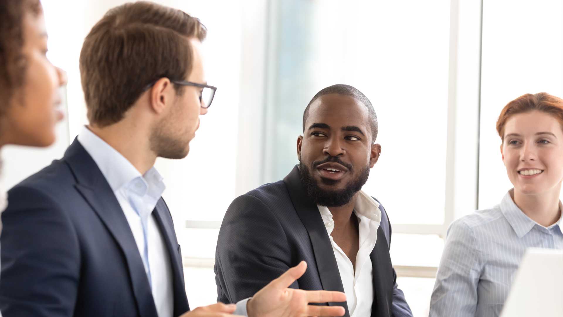 Group of leaders in a team meeting.