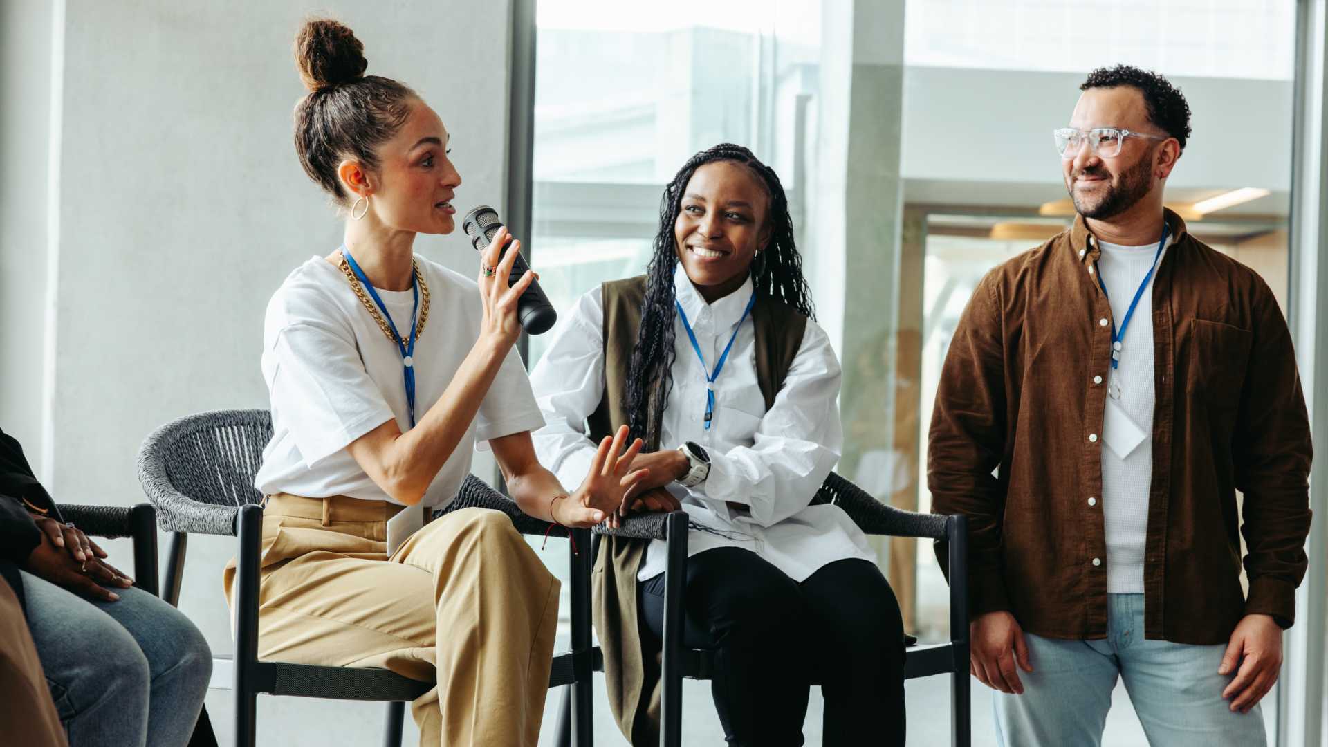 woman speaking at a meeting.