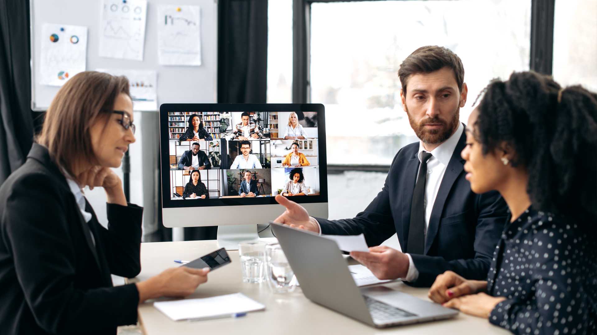 Hybrid workspace in a team meeting.