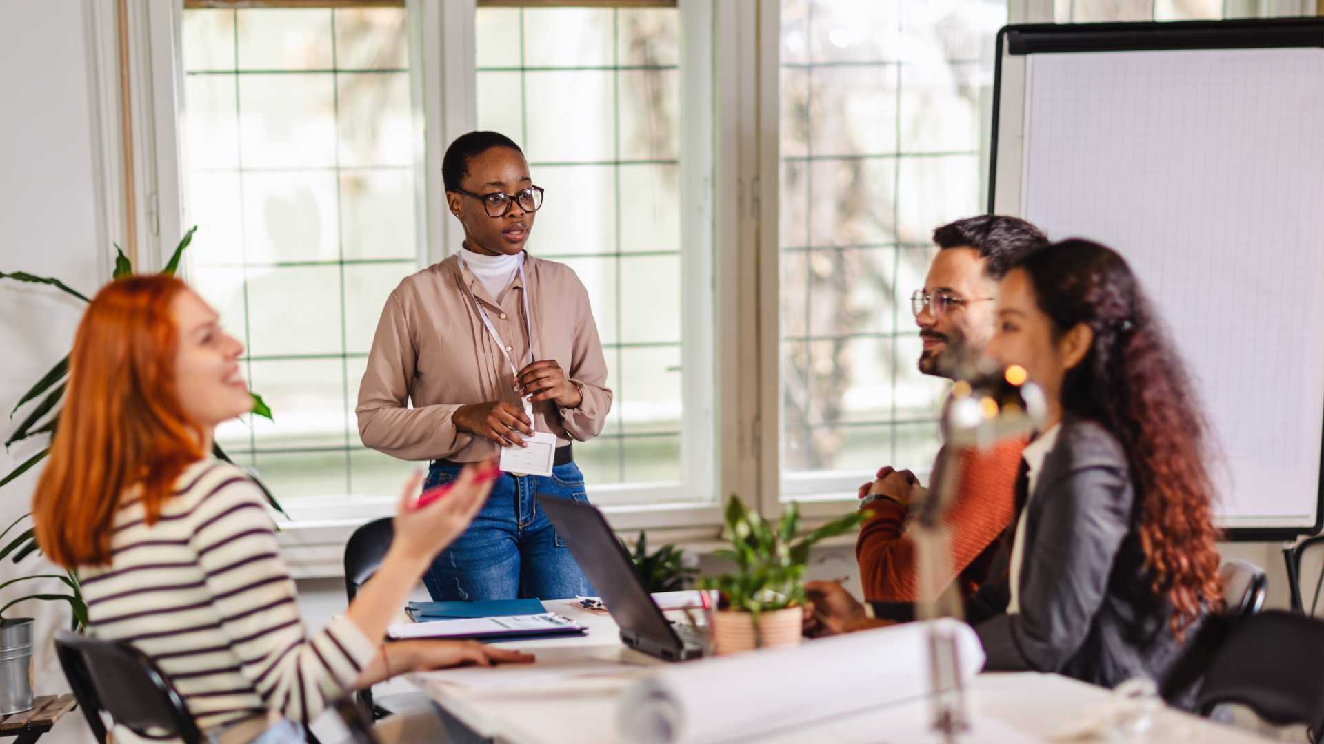 A group of people in a team meeting.