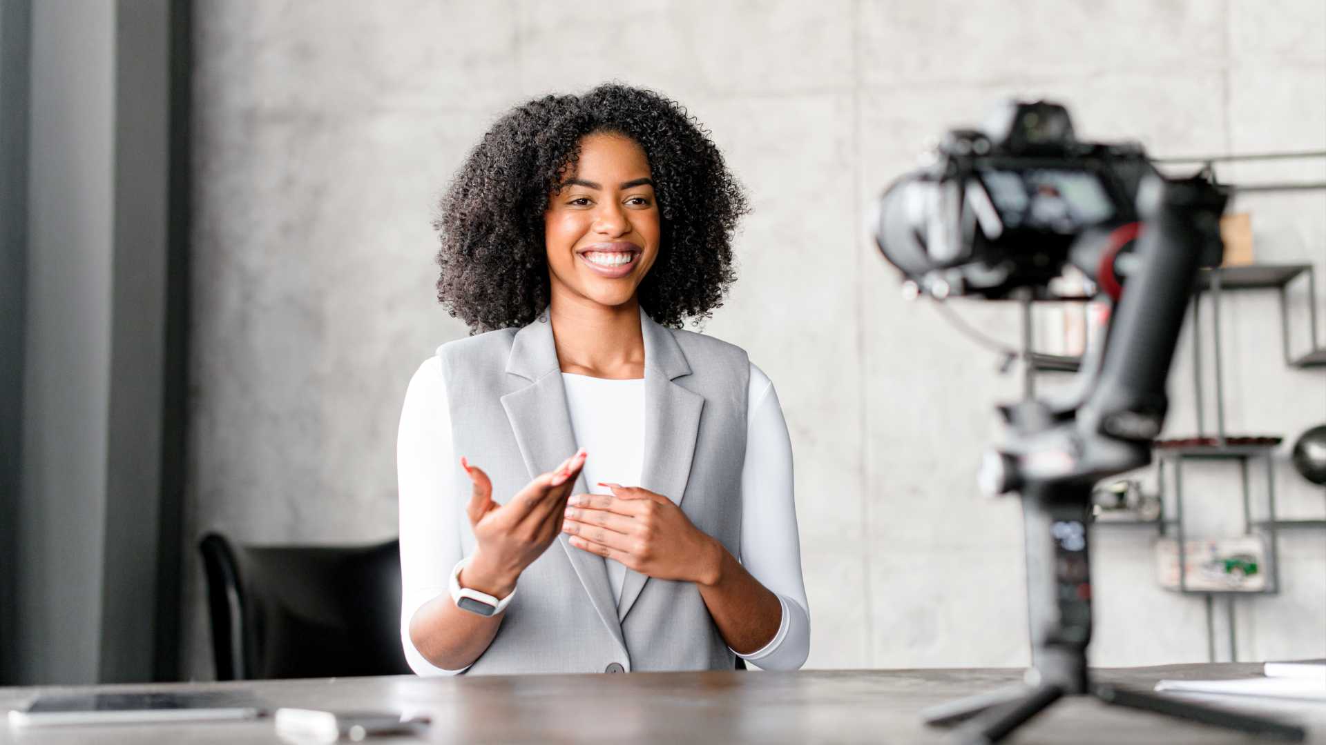 Woman recording video for work.