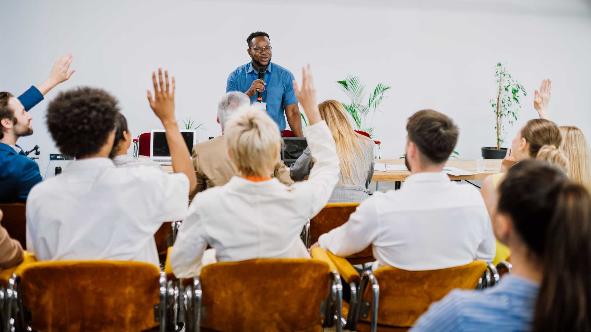 Man giving a session on something.