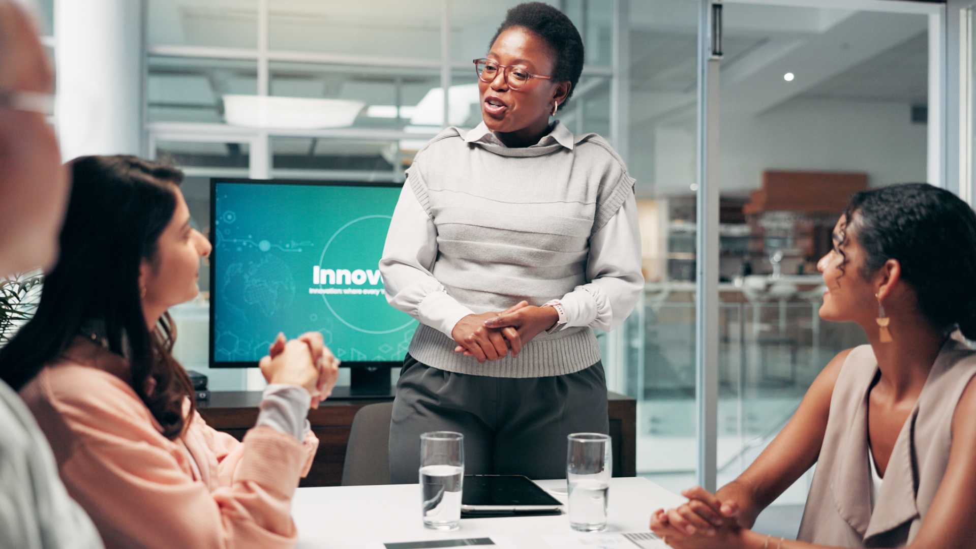 Woman leading a team meeting.