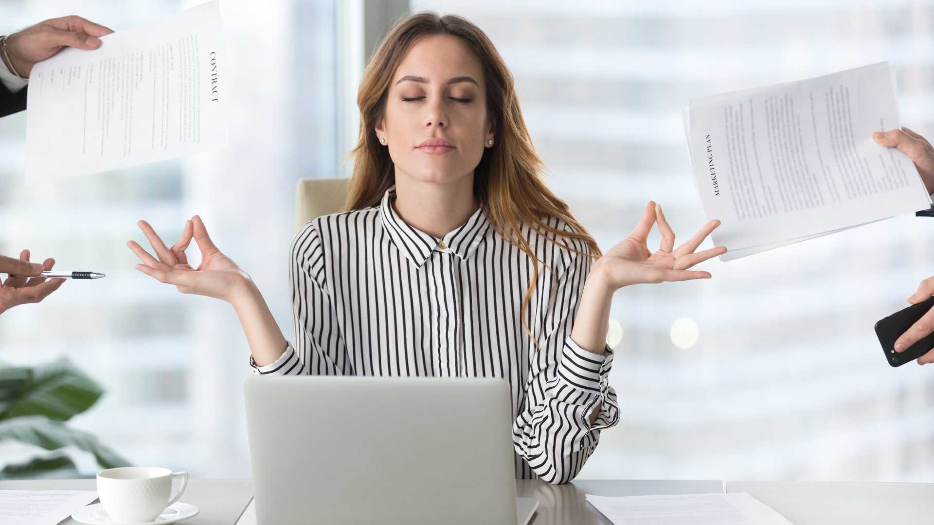 Office woman sitting in a calm state.