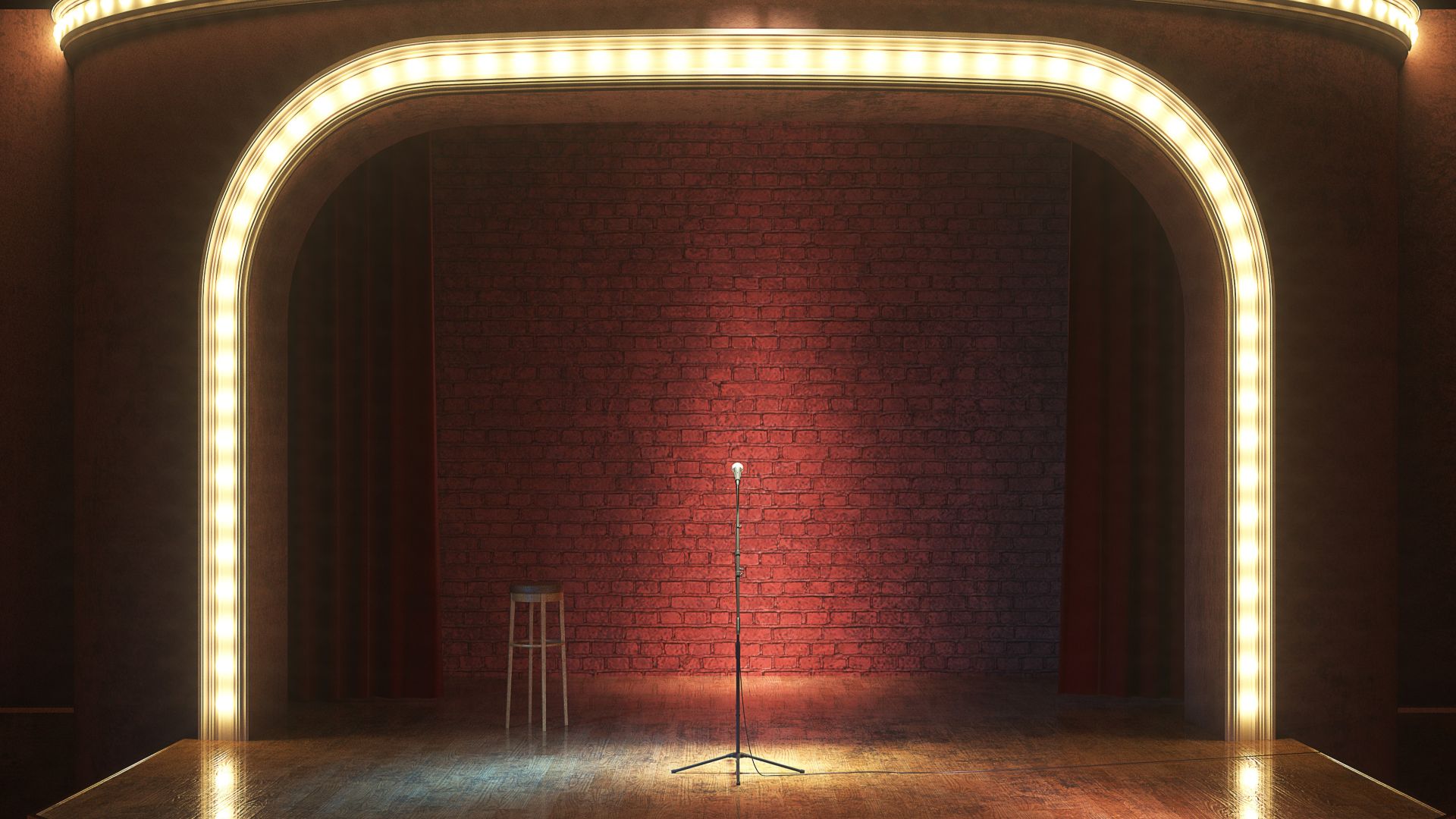 An image of a microphone stand on an empty stage