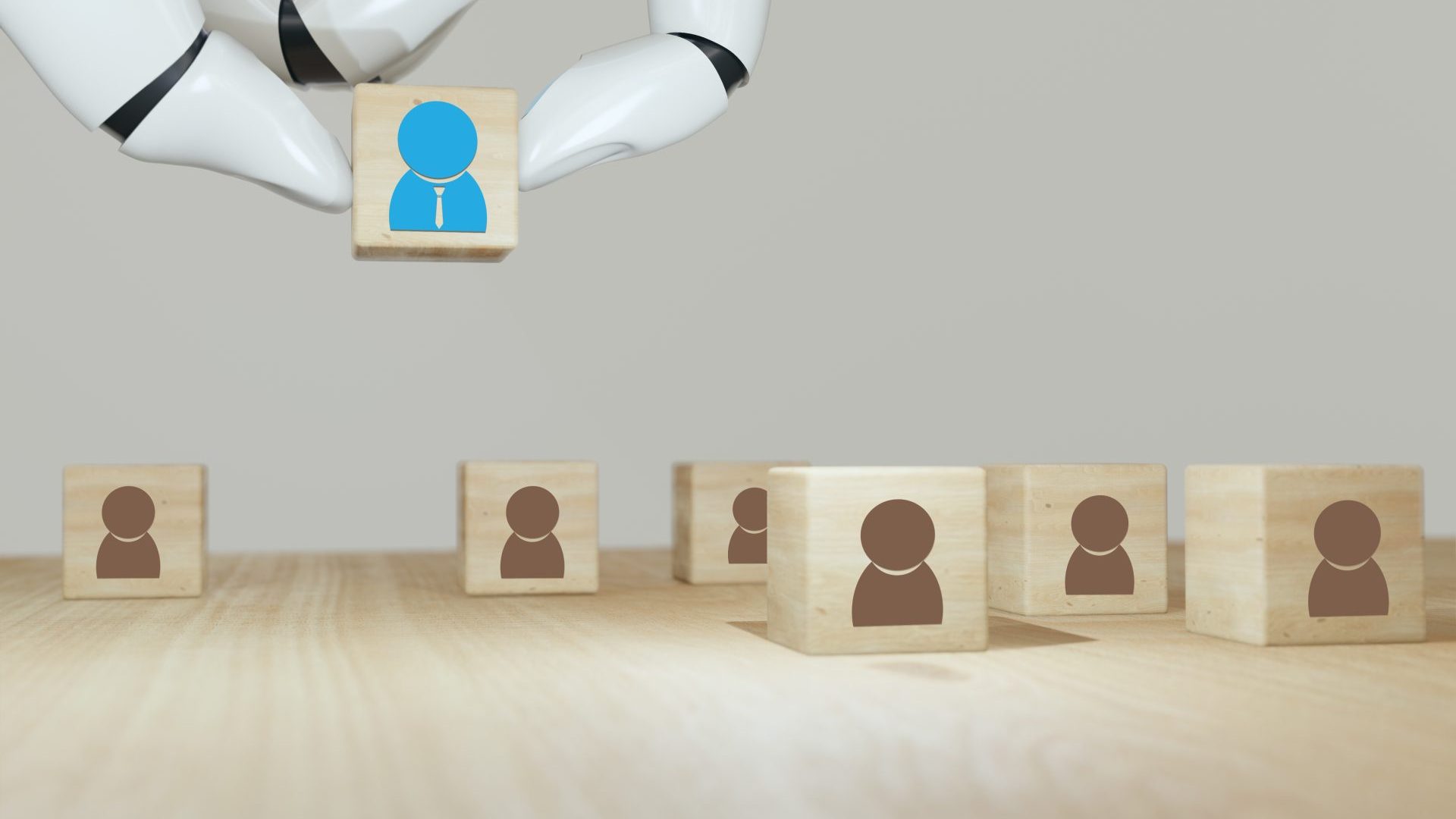 Robot moving pieces which appear to be the co-worker.