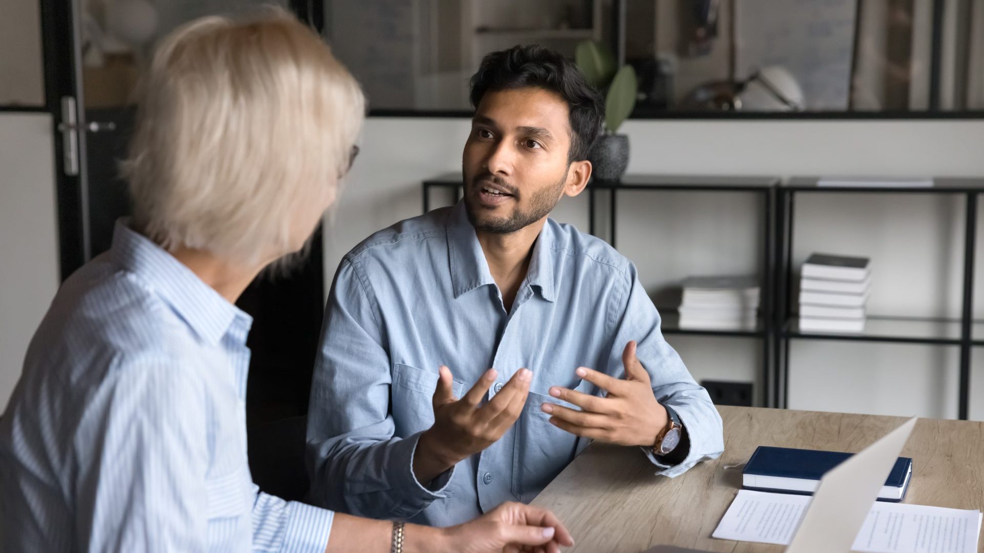 People in one on one meeting.