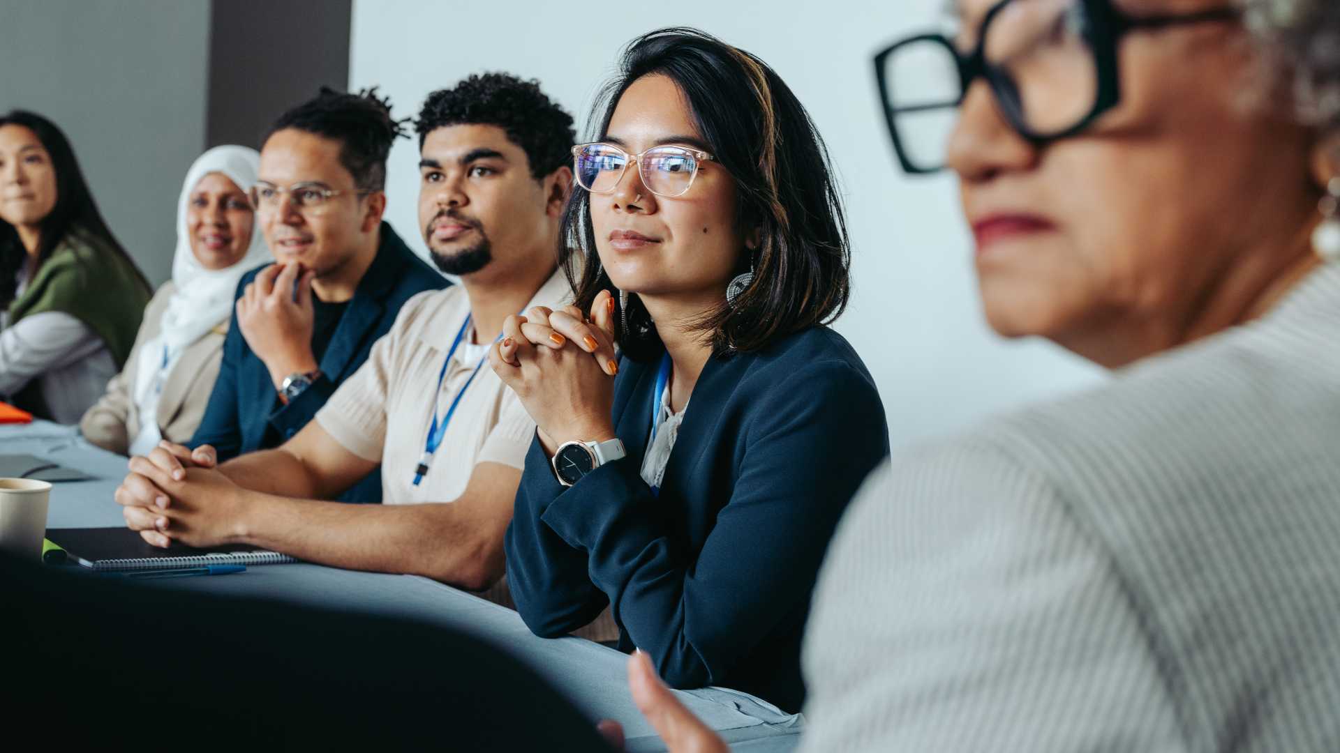 Cross-functional leaders participating in a meeting, illustrating collaboration among stakeholders involved in evaluating and purchasing learning technology.
